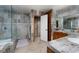 Bathroom features a shower, double vanity and linen closet at 2917 Chapala Dr, Las Vegas, NV 89120