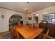 Spacious dining room featuring a large wooden table and elegant décor, perfect for Gathering gatherings at 2917 Chapala Dr, Las Vegas, NV 89120