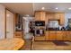 Well-equipped kitchen featuring wood cabinets, built-in appliances, and a cozy breakfast nook area at 2917 Chapala Dr, Las Vegas, NV 89120