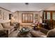 Comfortable living room featuring hardwood floors and many windows at 2917 Chapala Dr, Las Vegas, NV 89120