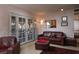 Comfortable living room with French doors, plush seating, and serene views of the outdoor area at 2917 Chapala Dr, Las Vegas, NV 89120