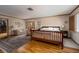 Spacious main bedroom features a walk-in closet, sitting area, wood floors, and natural light at 2917 Chapala Dr, Las Vegas, NV 89120