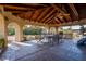 Charming outdoor patio with a wooden roof, built-in grill, and outdoor furniture perfect for entertaining at 2917 Chapala Dr, Las Vegas, NV 89120