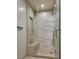 Modern shower with a frameless glass door and elegant tile design at 3726 Las Vegas Blvd # 2407, Las Vegas, NV 89158