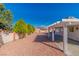 A clean backyard featuring decorative gravel and a wall for extra privacy at 451 Concord Way, Henderson, NV 89015