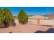 Rock landscaping and decorative concrete block wall providing privacy in backyard at 451 Concord Way, Henderson, NV 89015