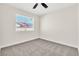 Bright bedroom with new carpet, a window, and neutral color palette at 451 Concord Way, Henderson, NV 89015
