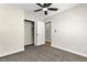 Bedroom featuring carpet flooring, a ceiling fan, closet, and neutral walls at 451 Concord Way, Henderson, NV 89015
