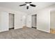 Bedroom with carpet flooring, neutral walls, closet, and ceiling fan at 451 Concord Way, Henderson, NV 89015