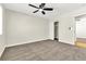 Spacious bedroom featuring neutral walls, carpet flooring, and a ceiling fan at 451 Concord Way, Henderson, NV 89015