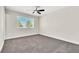 Bedroom with carpet flooring, neutral walls, and a window bringing in natural light at 451 Concord Way, Henderson, NV 89015