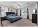 Primary bedroom with large bed and natural light at 460 Accelerando Way, Henderson, NV 89011