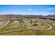Scenic aerial view of the community park with walking trails, picnic spots and mountain views at 460 Accelerando Way, Henderson, NV 89011