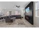 Open concept living room features fireplace and lots of natural light at 460 Accelerando Way, Henderson, NV 89011