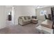 Comfortable living room with sectional sofa, keyboard, and TV setup at 460 Accelerando Way, Henderson, NV 89011