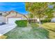 Charming single story home with a well maintained front yard and an attached two car garage at 4837 Morning Splash Ave, Las Vegas, NV 89131
