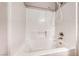 Bright shower-over-tub with a handheld shower head and tiled walls at 4837 Morning Splash Ave, Las Vegas, NV 89131
