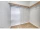 Walk-in closet with built in clothes rods and carpet flooring at 4837 Morning Splash Ave, Las Vegas, NV 89131