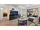 Interior living area features comfortable seating and a sliding glass door at 4861 S Torrey Pines Dr # 106, Las Vegas, NV 89103