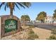 Beautiful community sign for Los Verdes with manicured landscaping, offering an inviting curb appeal at 4899 S Torrey Pines Dr # 104, Las Vegas, NV 89103