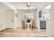 Cozy dining area features hardwood floors, neutral paint, and lots of natural light at 4899 S Torrey Pines Dr # 104, Las Vegas, NV 89103
