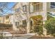 Charming condo features a private balcony, stucco finish, and well-maintained landscaping at 4899 S Torrey Pines Dr # 104, Las Vegas, NV 89103