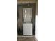 Compact laundry setup featuring a stacked washer and dryer unit at 4899 S Torrey Pines Dr # 104, Las Vegas, NV 89103