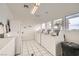 Well-lit community laundry room with multiple washing machines at 4899 S Torrey Pines Dr # 104, Las Vegas, NV 89103
