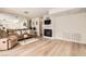 Spacious living room features hardwood floors, a fireplace, and plenty of natural light at 4899 S Torrey Pines Dr # 104, Las Vegas, NV 89103