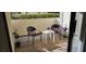 Relaxing covered patio with stylish outdoor seating and charming decor at 4899 S Torrey Pines Dr # 104, Las Vegas, NV 89103