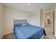 Cozy bedroom with plush bedding and closet, creating a comfortable and inviting space at 542 Foothill Cove Ln, Henderson, NV 89002