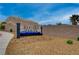 Horizon Trails community entrance sign with a landscaped foreground and building in the background at 542 Foothill Cove Ln, Henderson, NV 89002