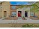Attractive townhome exteriors with landscaped walkways and inviting front door entrances, perfect for families at 542 Foothill Cove Ln, Henderson, NV 89002