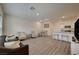 Spacious living area open to kitchen and dining, ideal for modern living and entertaining at 542 Foothill Cove Ln, Henderson, NV 89002