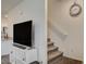 Cozy living room with stairs at 542 Foothill Cove Ln, Henderson, NV 89002