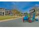 Modern playground with climbing structures and slides, perfect for active outdoor play at 542 Foothill Cove Ln, Henderson, NV 89002
