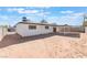 The backyard of this home features a covered patio and ample space at 6320 Hobart Ave, Las Vegas, NV 89107