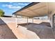 A covered patio offers a shady space in this backyard at 6320 Hobart Ave, Las Vegas, NV 89107