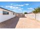 Spacious backyard enclosed by a concrete wall, offering a blank canvas for customization and outdoor enjoyment at 6320 Hobart Ave, Las Vegas, NV 89107