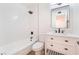 Clean, modern bathroom with subway tile, a shower-tub combo, and updated vanity at 6320 Hobart Ave, Las Vegas, NV 89107