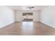 Minimalist room with sliding glass doors and new flooring at 6320 Hobart Ave, Las Vegas, NV 89107