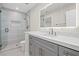 Elegant bathroom showcasing a walk-in shower and dual sink vanity at 6335 Mount Eden Ave, Las Vegas, NV 89139