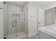 Modern bathroom with a glass-enclosed shower and sleek fixtures at 6335 Mount Eden Ave, Las Vegas, NV 89139