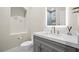 The stylish bathroom features a marble countertop, modern vanity, and bronze hardware at 6335 Mount Eden Ave, Las Vegas, NV 89139