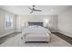 Bright bedroom with a ceiling fan, plush rug, and stylish decor, creating a relaxing retreat at 6335 Mount Eden Ave, Las Vegas, NV 89139
