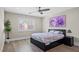 Cozy bedroom with hardwood floors, plantation shutters, and stylish decor at 6335 Mount Eden Ave, Las Vegas, NV 89139