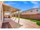 Expansive covered patio featuring an outdoor kitchen and plenty of room for outdoor dining and relaxation at 6335 Mount Eden Ave, Las Vegas, NV 89139
