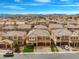 Beautiful two-story home with a three car garage and manicured front lawn at 6335 Mount Eden Ave, Las Vegas, NV 89139