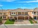 Beautiful two-story home with a three car garage and manicured front lawn at 6335 Mount Eden Ave, Las Vegas, NV 89139