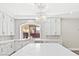 Modern kitchen features quartz countertops, stainless steel appliances, and custom cabinetry at 6335 Mount Eden Ave, Las Vegas, NV 89139